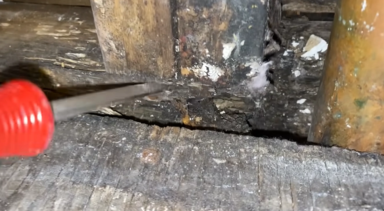 Damaged pipe being probed during a water damage inspection in Lincoln, NE