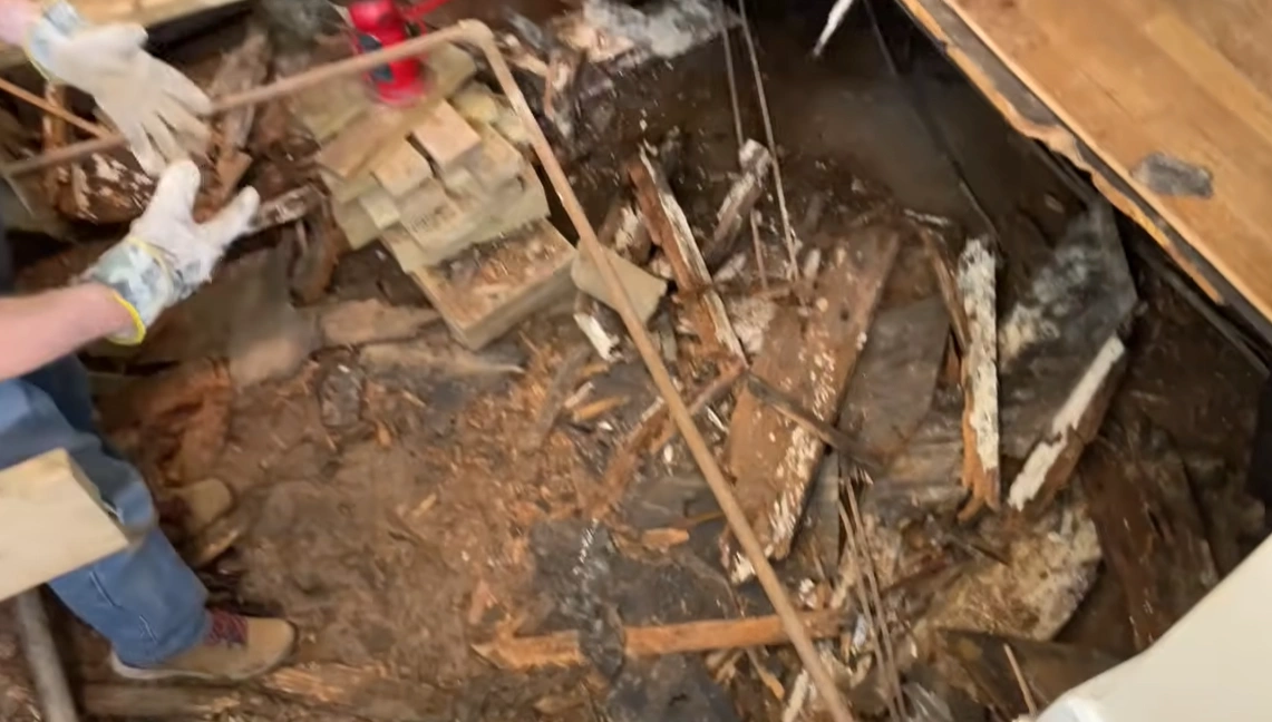 Flood Cleanup in Lincoln, NE Flood cleanup in Lincoln, NE showing debris pile after water damage restoration