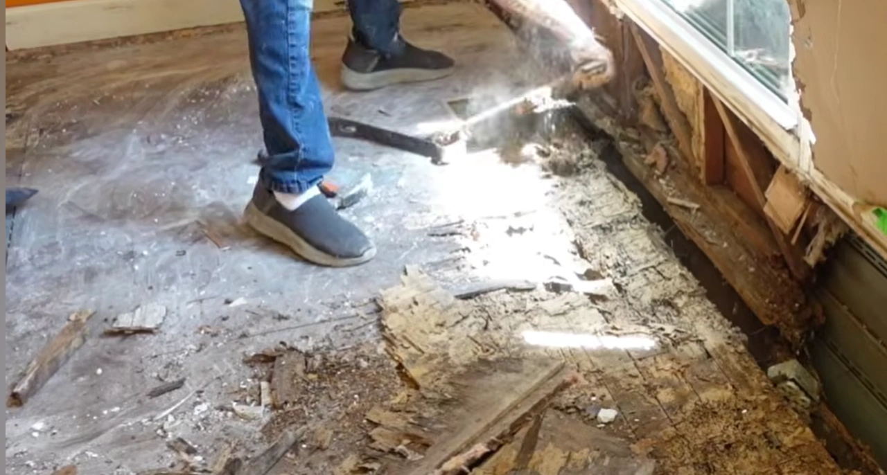 Rotted structural beam from water damage in Malcolm, NE