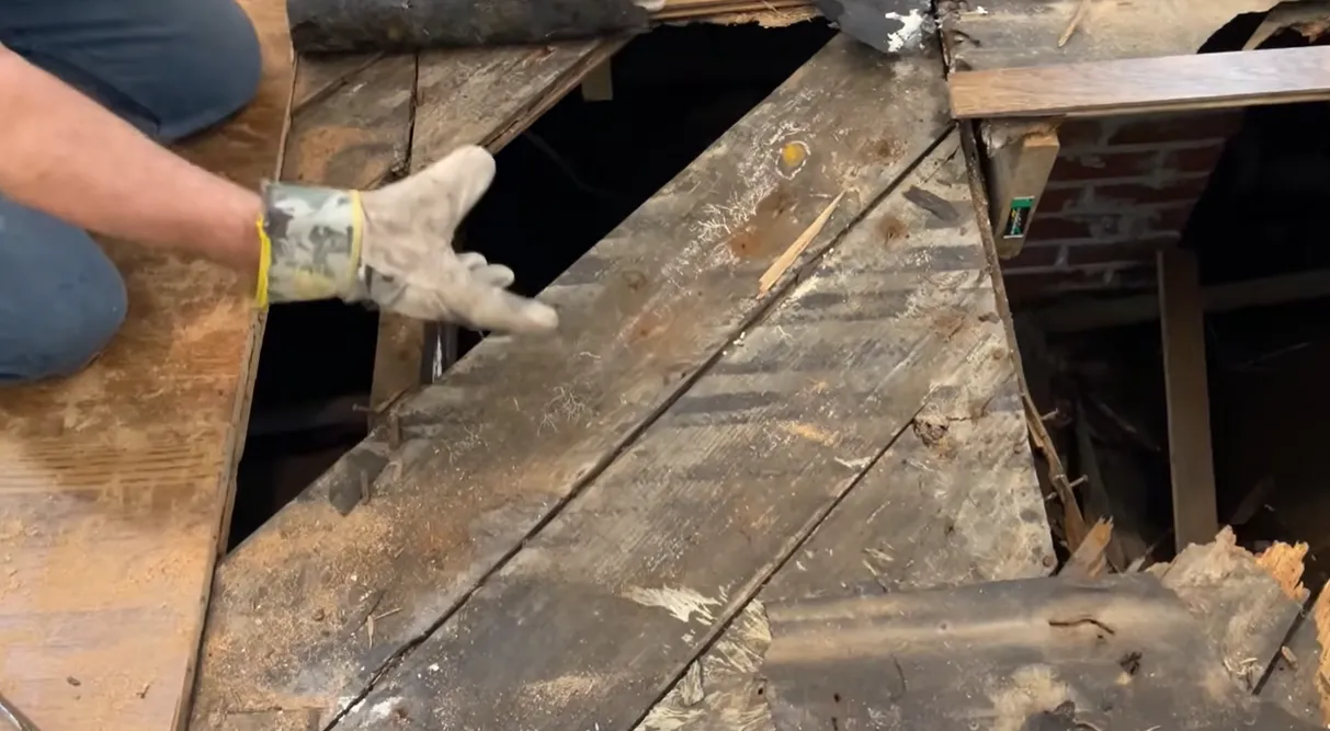 Flood-damaged subfloor assessed after the October 2026 flood in Lincoln, NE