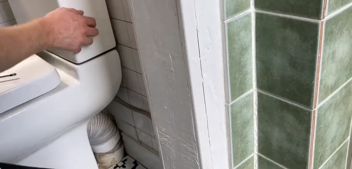 Toilet drain line during sewage backup cleanup in Lincoln, NE