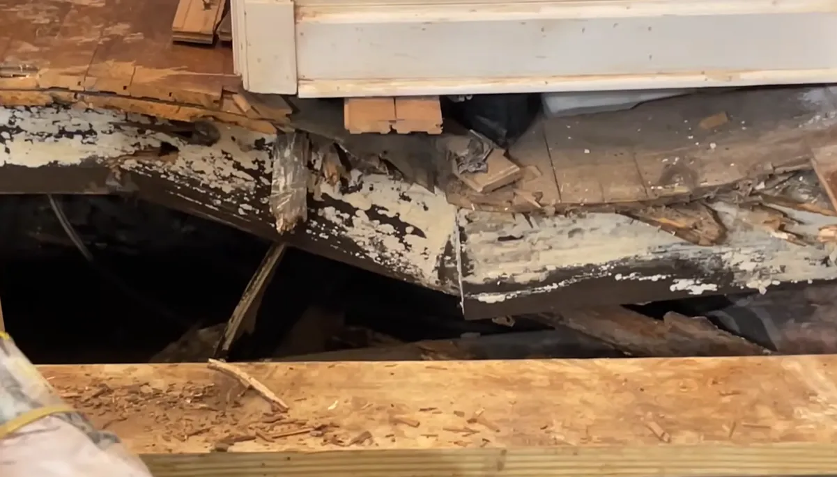 Rotted structural beam after storm damage in Lincoln, NE