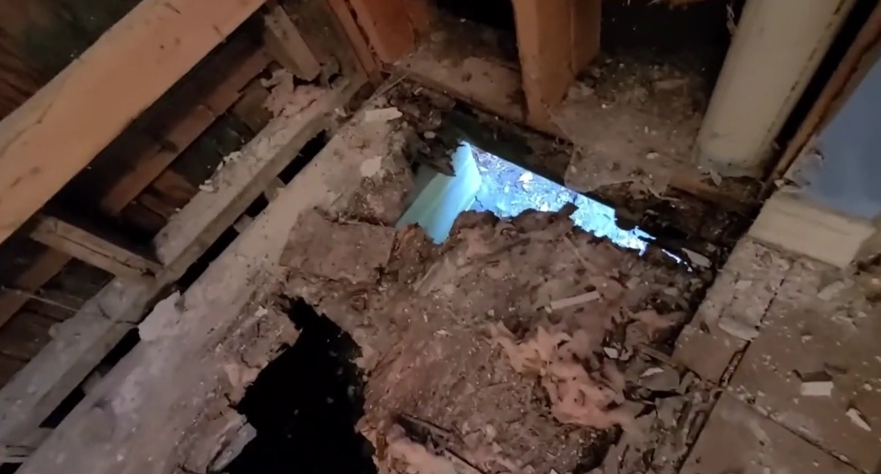 Bathroom floor water damage in University Place, Lincoln, NE